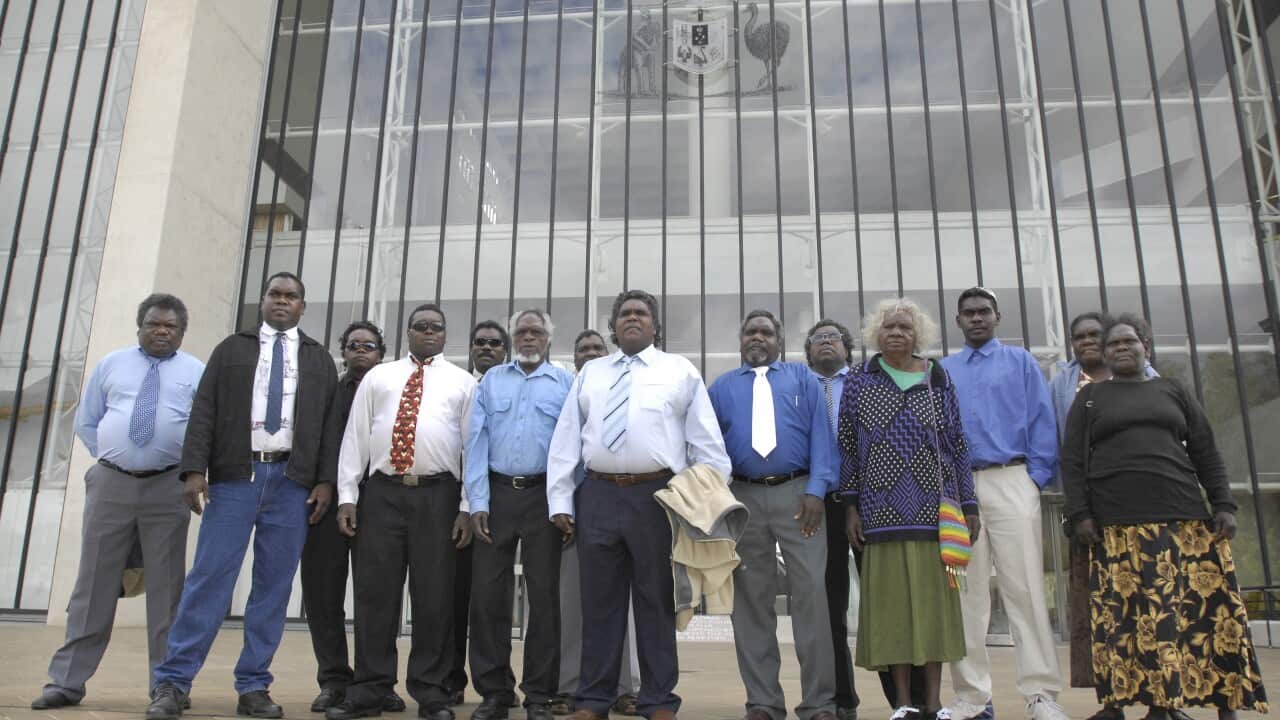 Yolngu man, Djambawa Marawili leads other traditional owners from Blue Mud Bay the High Court to hear the result of their claim, Wednesday, Dec 5, 2007.