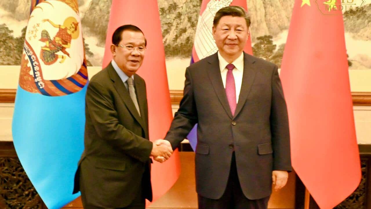 Hun Sen and Wang Huning.jpg