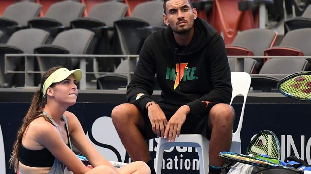Nick Kyrgios and his girlfriend Ajla Tomljanovic during practice.