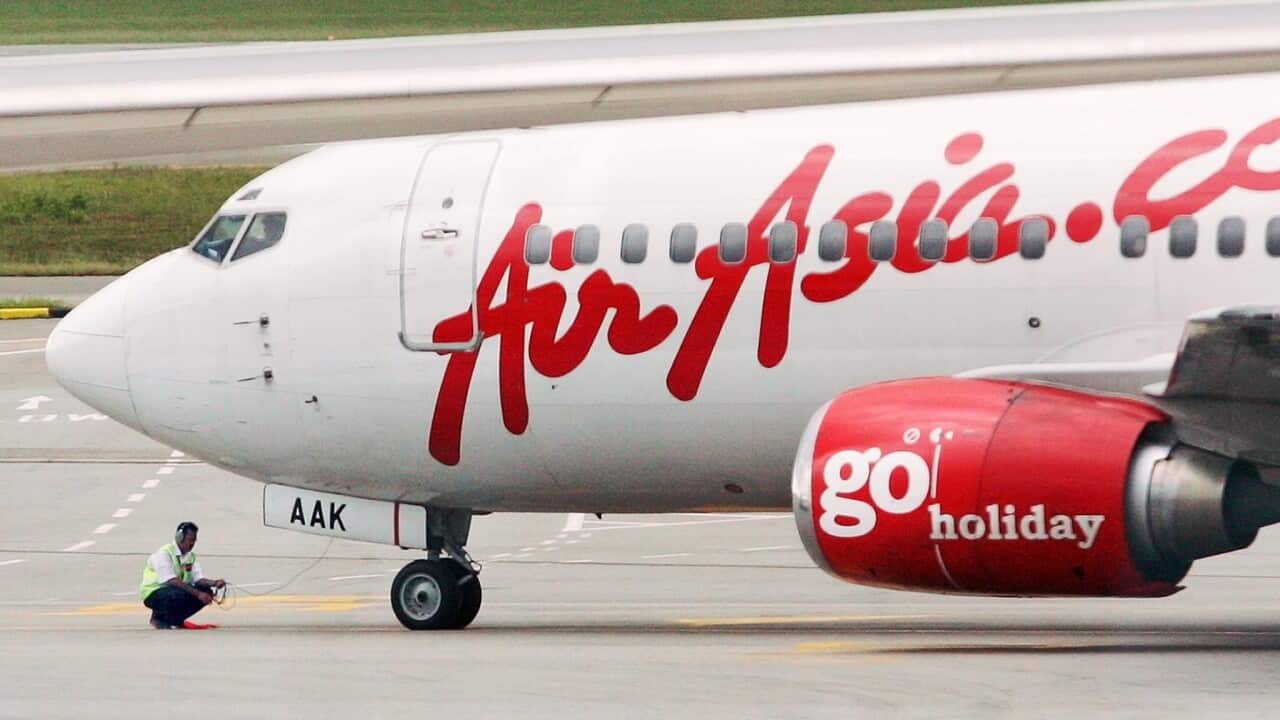 A Chinese passenger berated the stewardess of the budget airline Thai AirAsia before pouring hot water on her. (EPA)