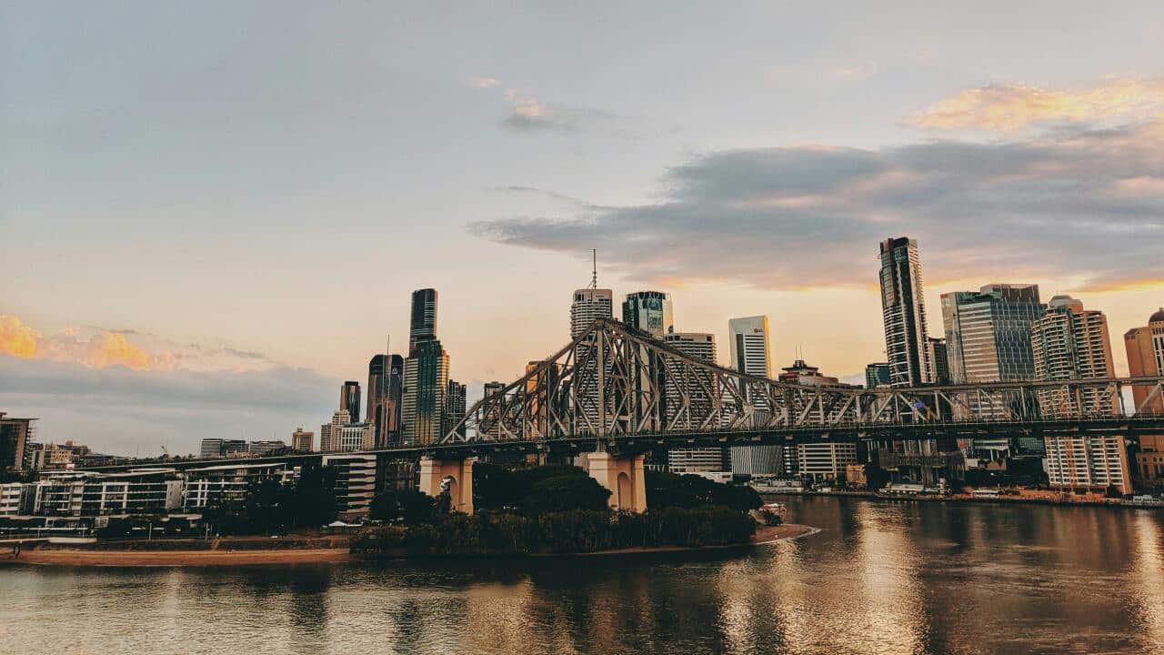Photo of Bridge and Buildings During Golden Hour
