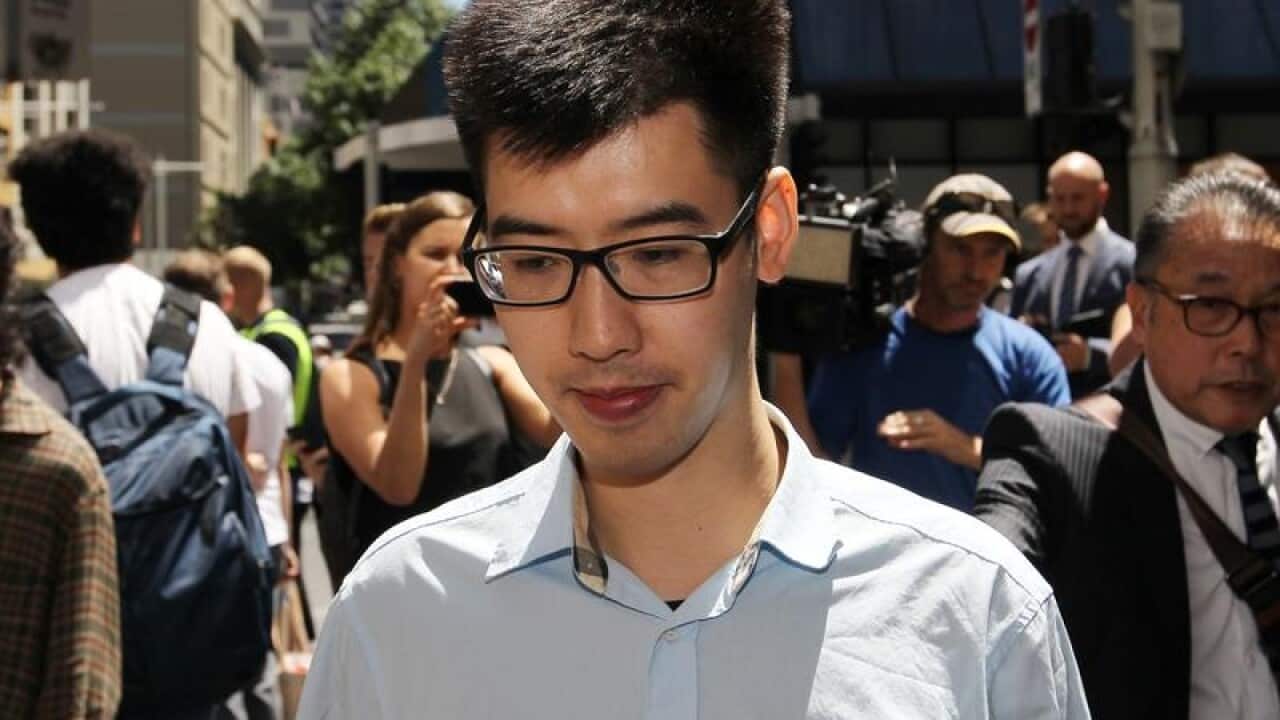 Yi Zheng is seen leaving the Downing Centre Courts