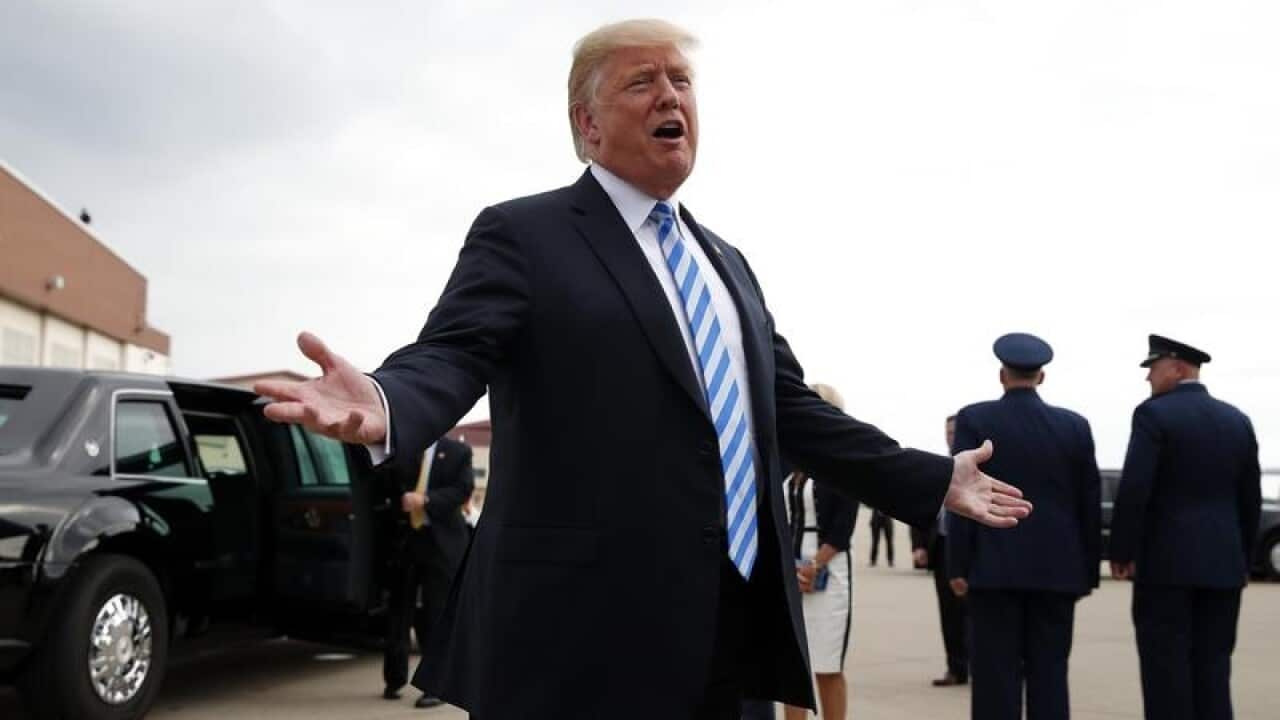 President Donald Trump speaking as he steps off Air Force One,
