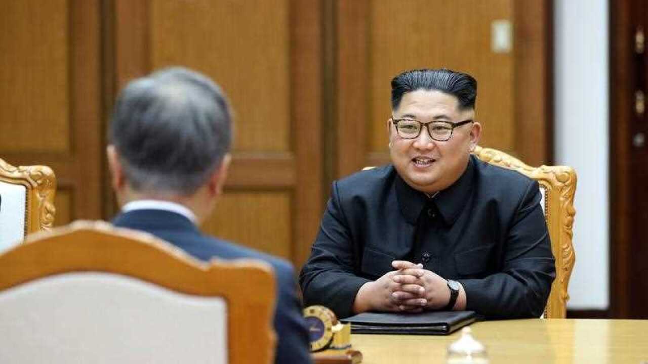 North Korean leader Kim Jong-Un (R) speaking with South Korean President Moon Jae-In (L) during their second meeting.