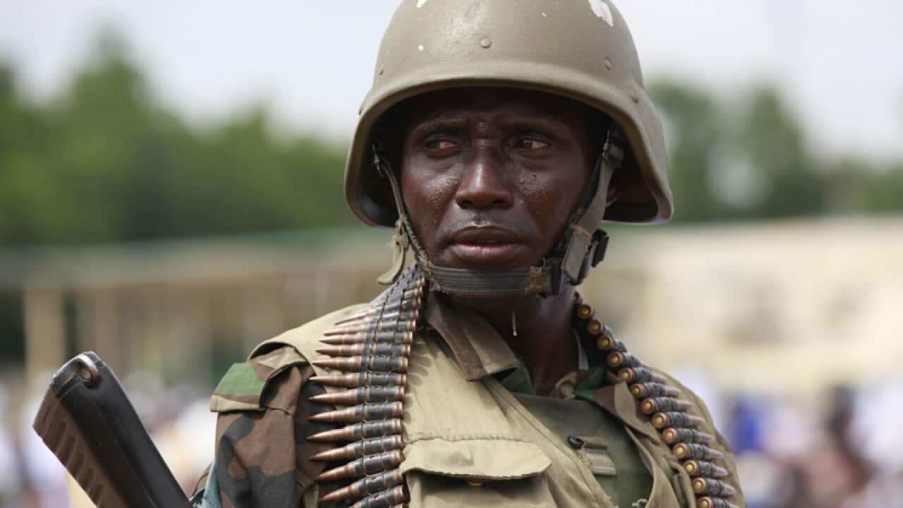 A Nigerian soldier stand guards in Maiduguri