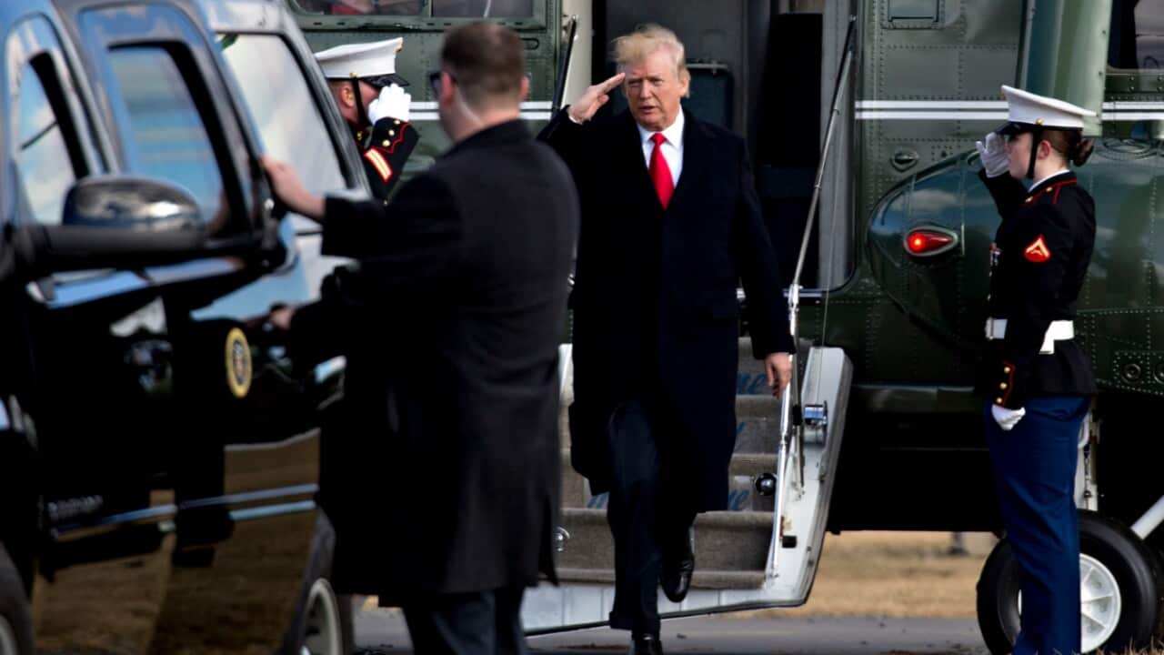 President Donald Trump salutes after arriving on Marine One on the South Lawn of the While House in Washington, D.C., U.S., on Thursday, Feb. 1, 2018. 