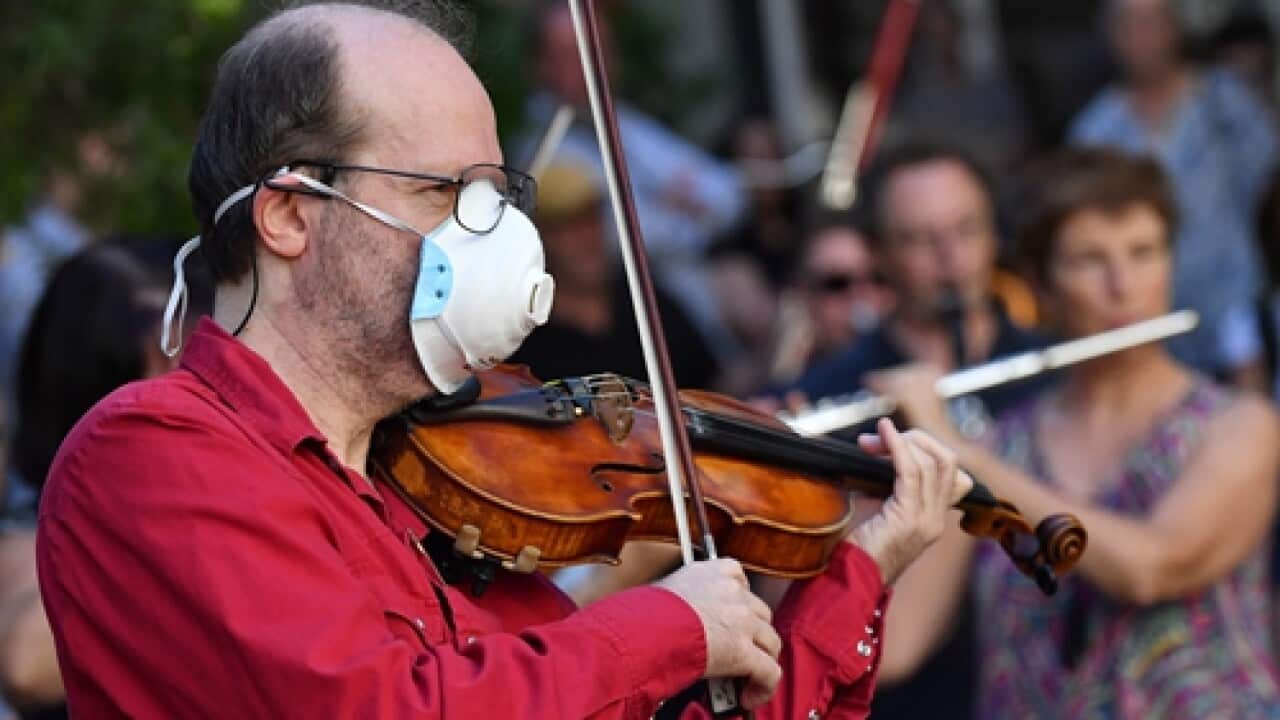 Musicians perform to protest their forced layoff without pay, and demand financial support to the performing arts sector devastated by the coronavirus.