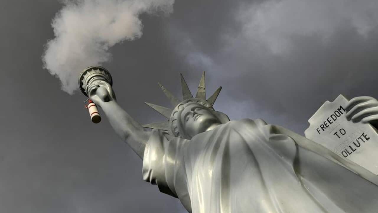 A replica Statue of Liberty by Danish artist Jens Galschiot.