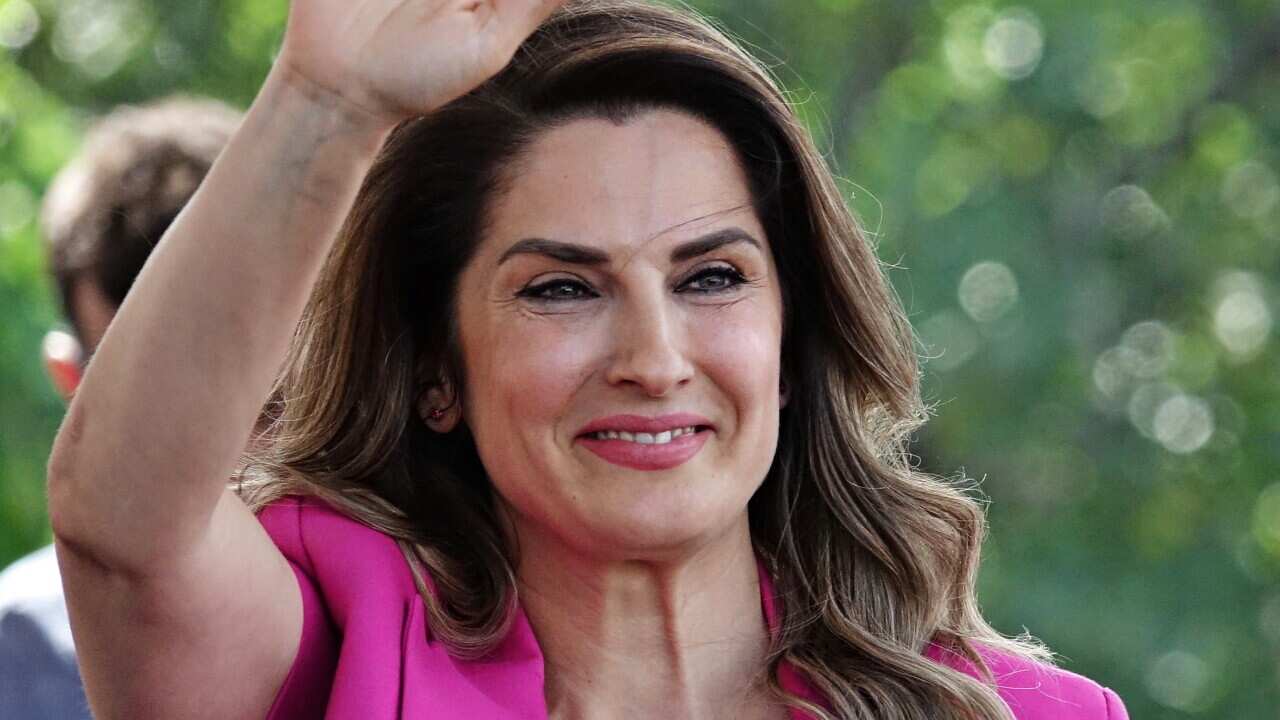 Basak Demirtas greets people at the Green Left Party's Diyarbakir rally