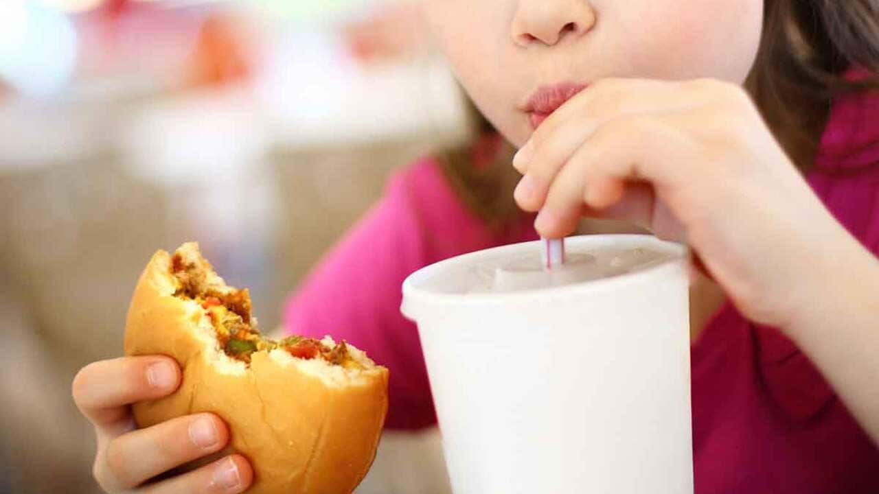 Child eating junk food