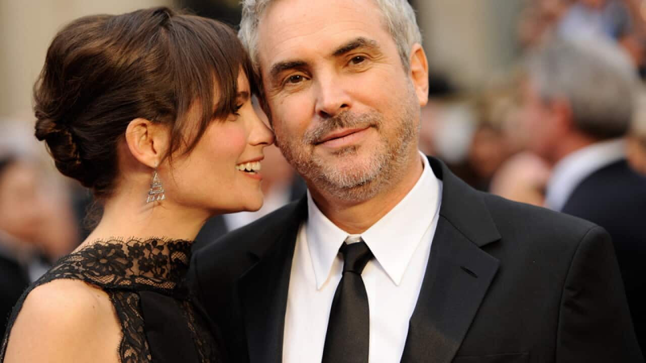 Annalisa Bugliani, left, and Alfonso Cuarón