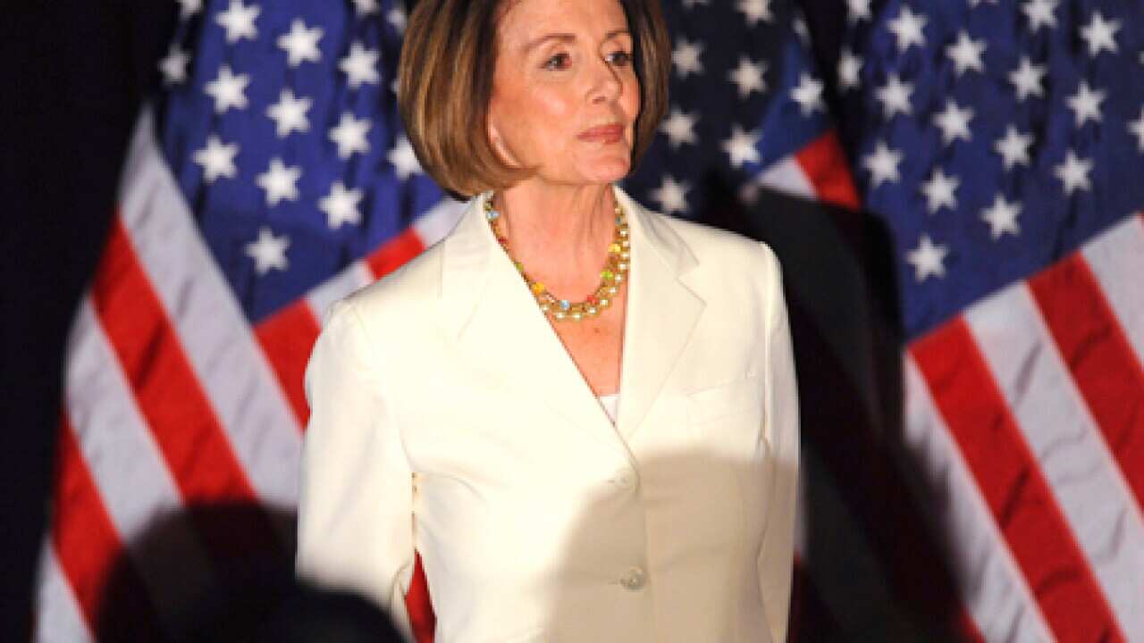 pelosi_sad_flag_101104_B_reuters_991535421