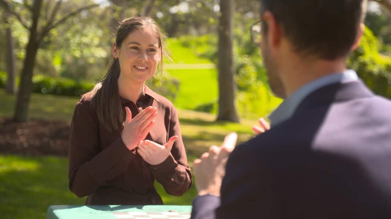 Auslan interpreter Emma Roeschlein decided to learn the language four years ago to better communicate with the deaf community. 
