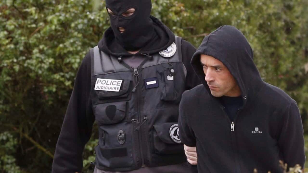  A French policeman escorts ETA commander Mikel Irastorza (R) after his arrest at the Serres district in Ascain, France, 05 November 2016. 