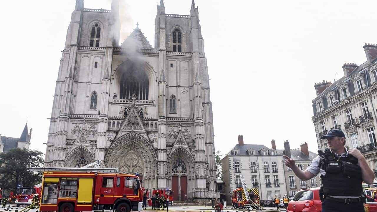 Firefighters at work to put out the blaze on Saturday.