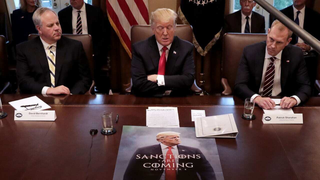US President Donald Trump (c) leads a meeting of his Cabinet