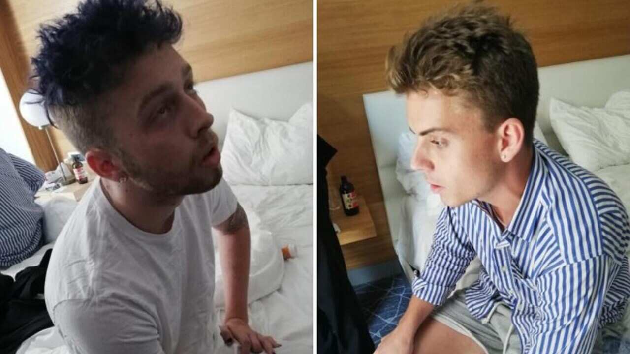 Gabriel Christian Natale Hjorth, right, and Finnegan Lee Elder, sit in their hotel room in Rome.
