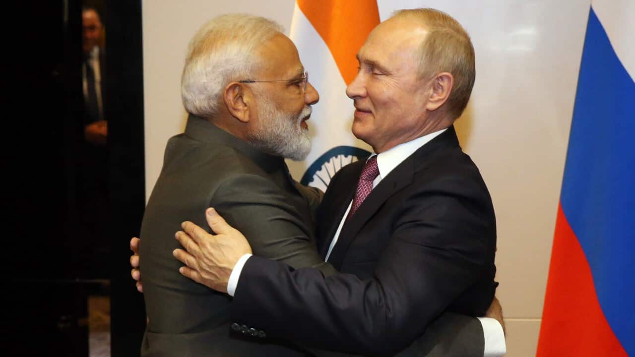 Indian Prime Minister Narendra Modi (left) and Russian President Vladimir Putin embrace