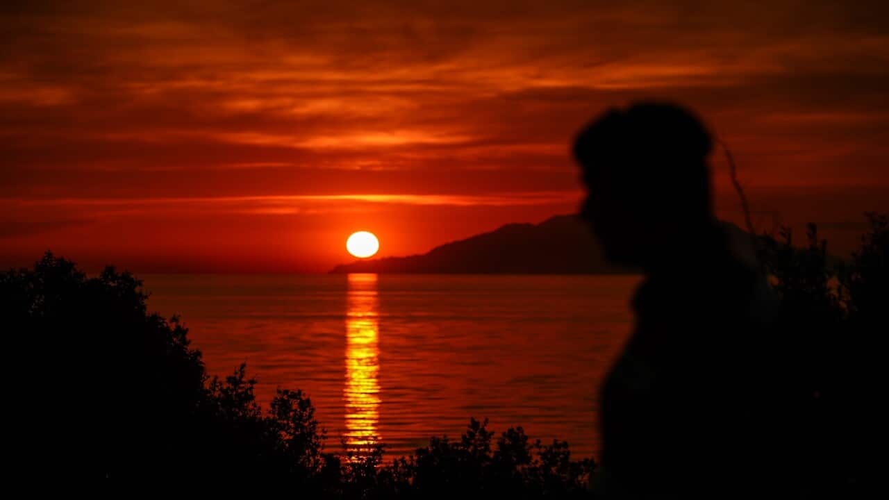 The sun sets as seen from the Anzac Cove beach in Gallipoli peninsula, Turkey, Tuesday, April 24, 2018,