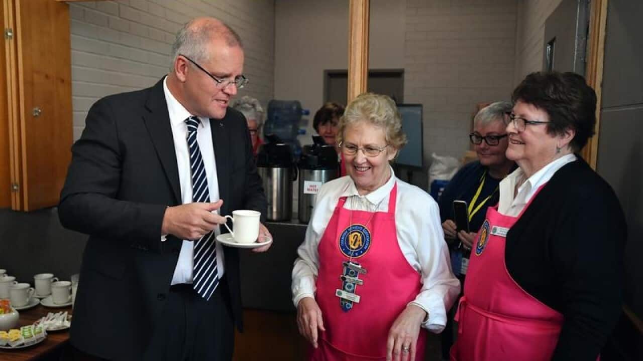 Scott Morrison enjoys a cuppa at the Albury CWA conference