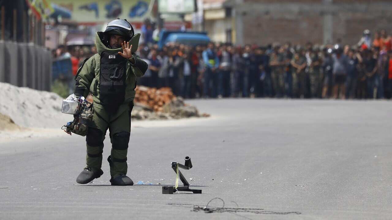 A Nepalese army bomb disposal squad member.