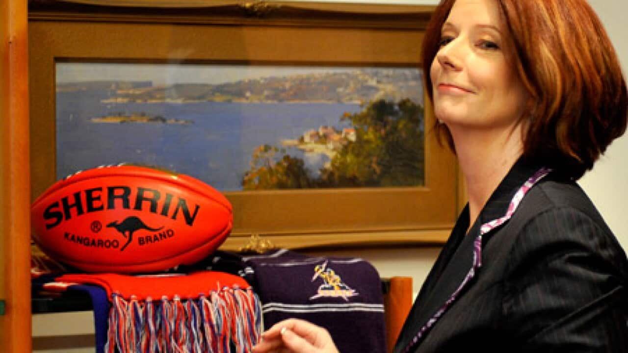 gillard_office_football_100630_AAP_1747013169