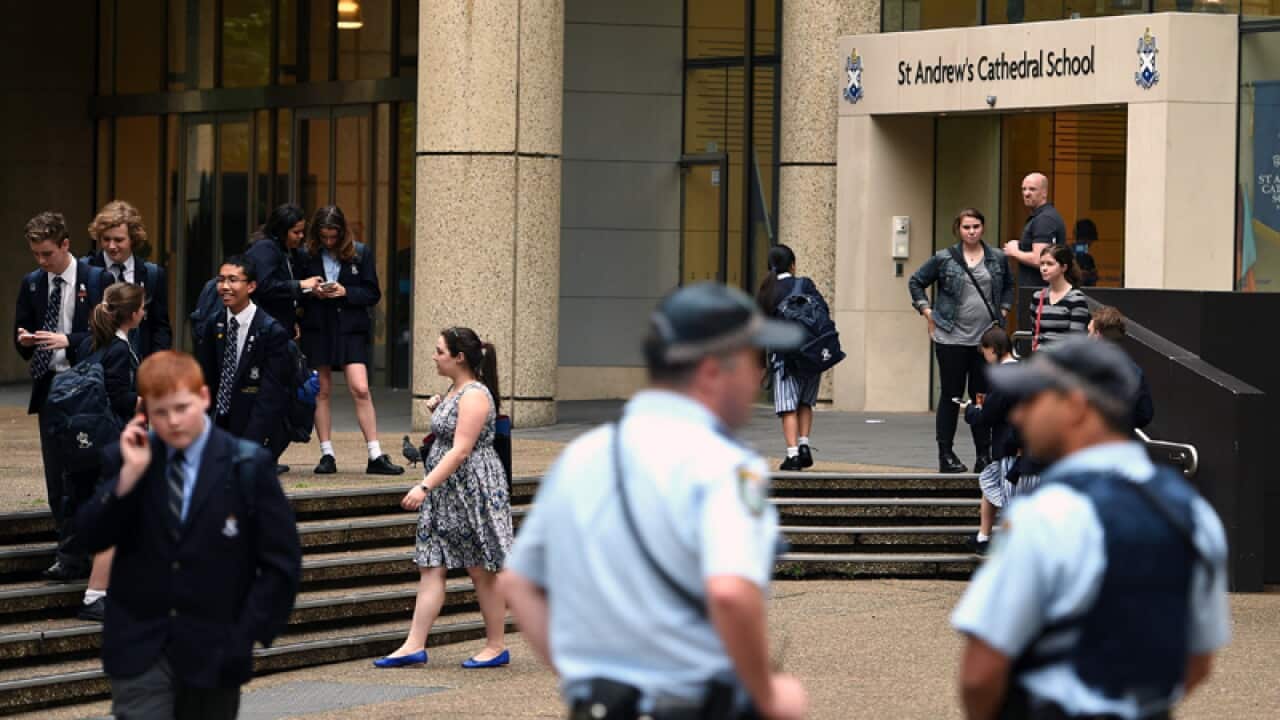 NSW Police are seen near St Andrews Cathedral School in Sydney