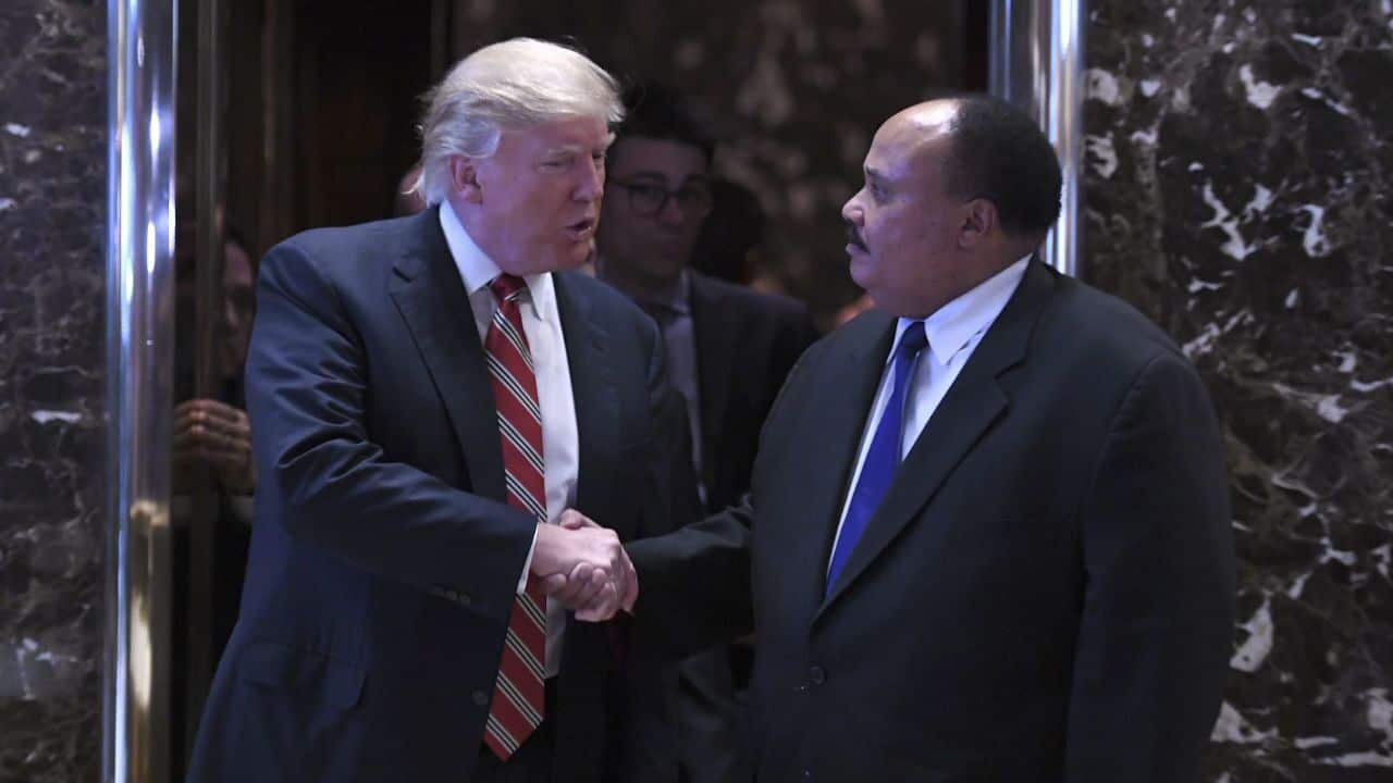 Donald Trump shakes hands with Martin Luther King III.