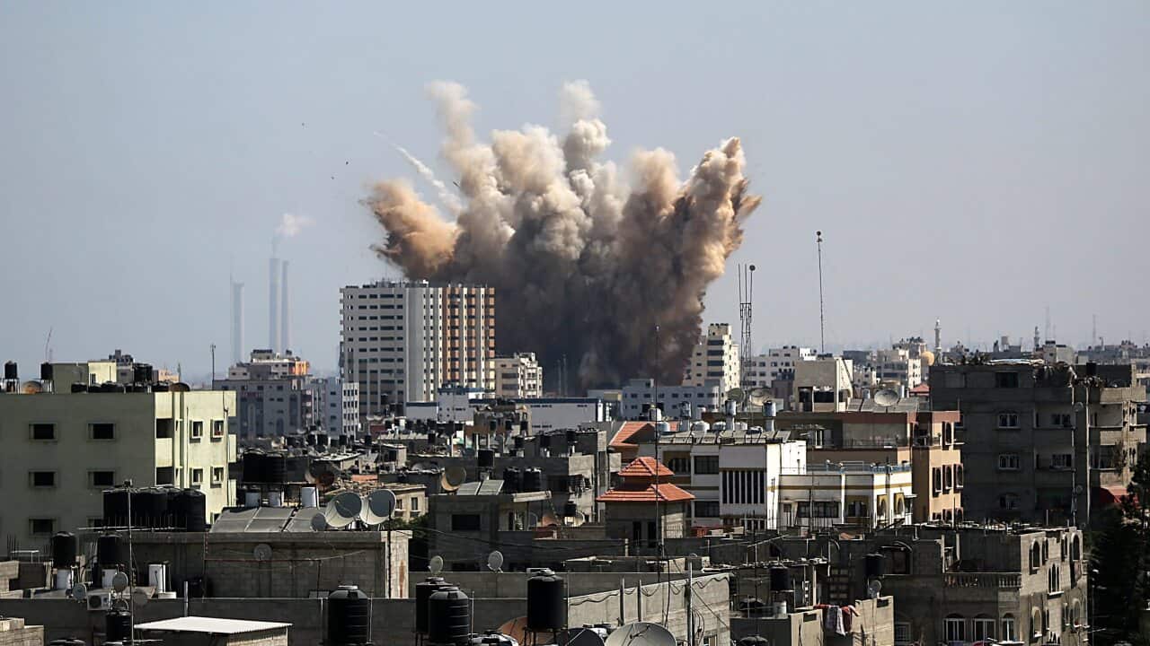 Smoke rises following Israeli air strikes in northern Gaza City (AAP)