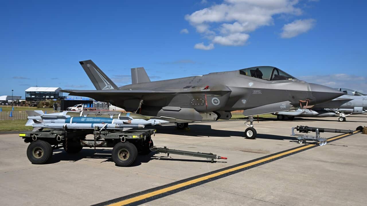 Missiles are seen on display next to the F-35A Lightning II fighter jet (AAP)