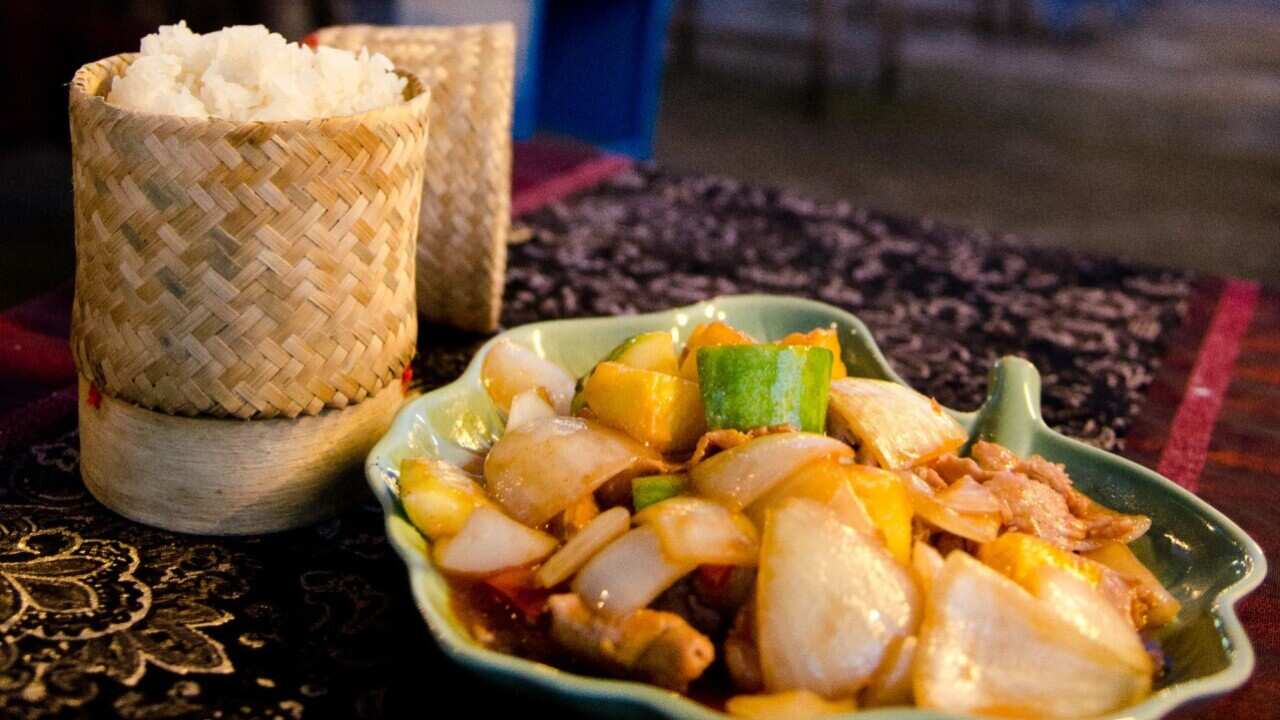 Sticky Rice with Sweet and Sour Chicken - Getty