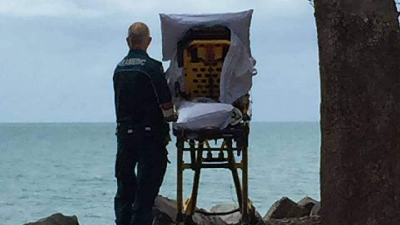 Queensland Ambulance Service shared photo of paramedics granting palliative patient a wish.