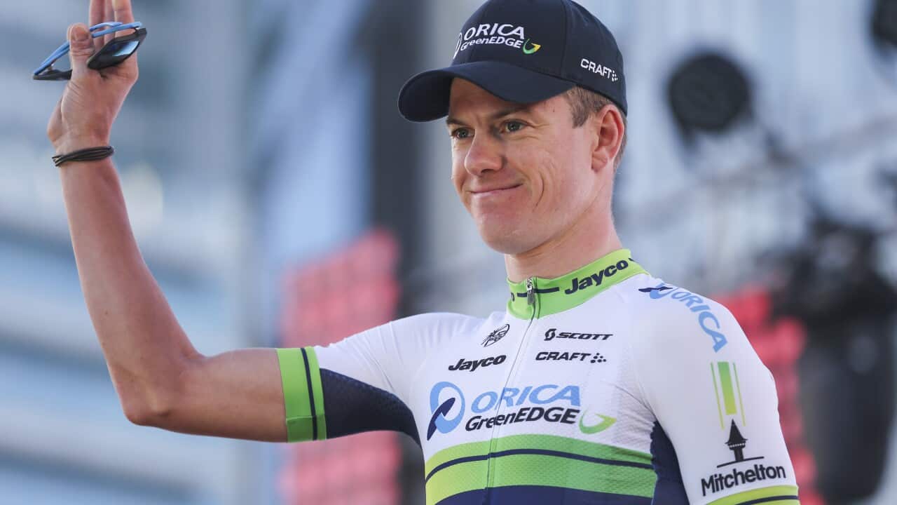 Simon Clarke of Australia waves during the teams presentation ahead of the 2015 Tour Down Under