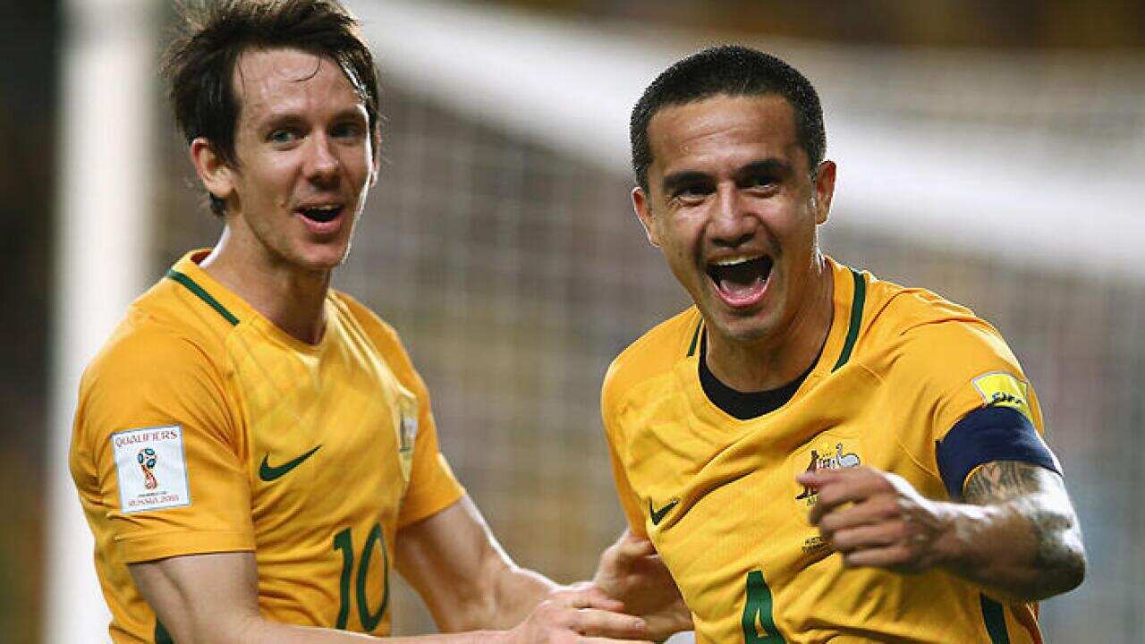 Robbie Kruse and Tim Cahill during a 2018 FIFA World Cup qualifier (Getty Images)
