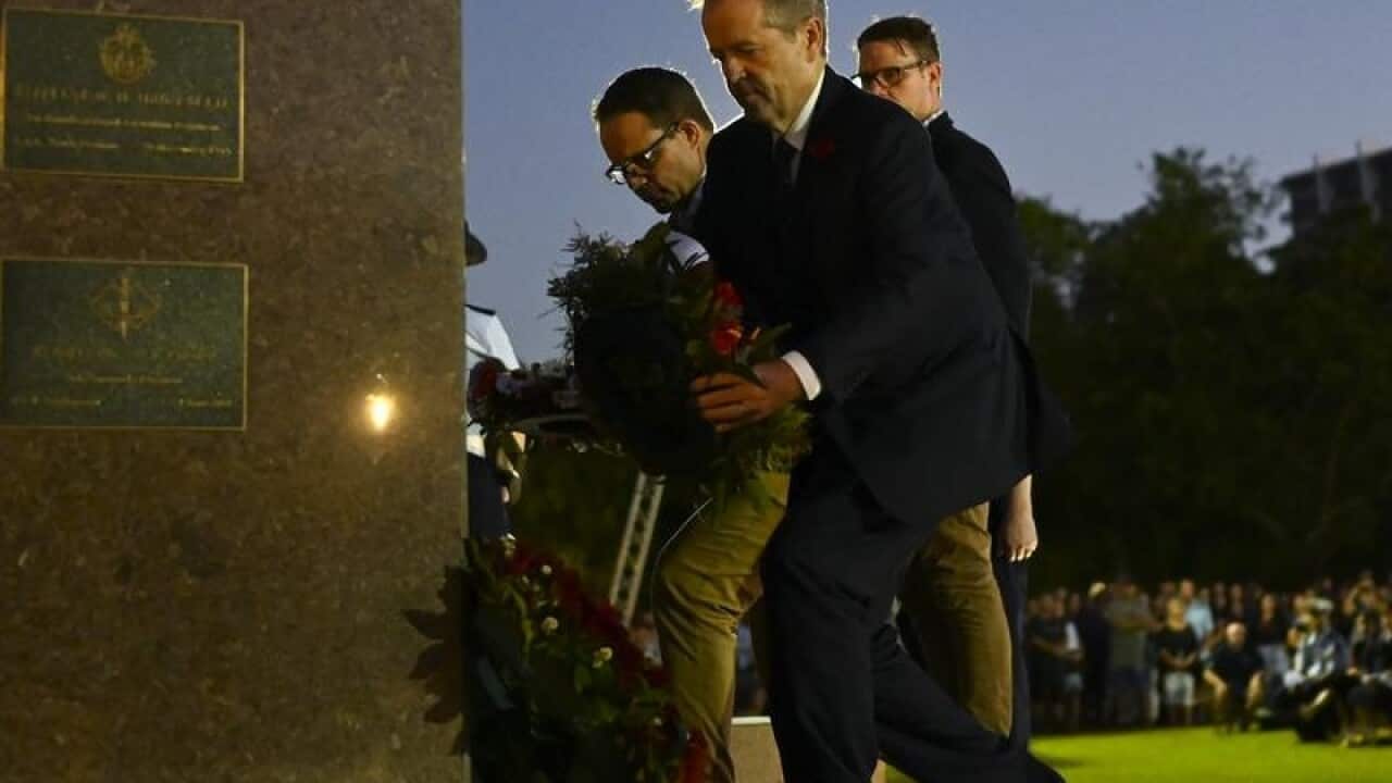 Bill Shorten has laid a wreath at the Anzac Day service in Darwin.