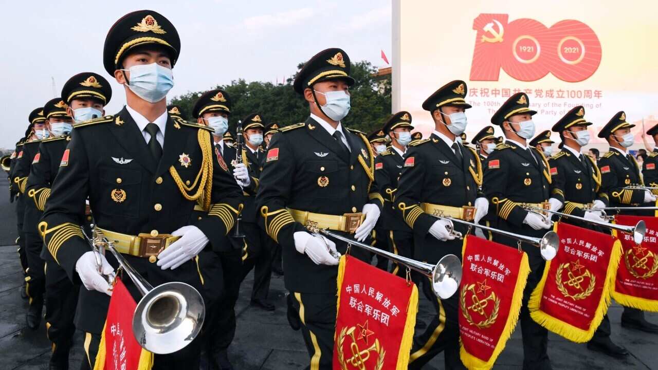 People's Liberation Army personnel wearing masks to protect against the coronavirus (AAP Image-Kyodo via AP Images)