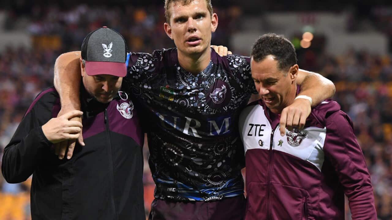 Sea Eagles player Thomas Trbojevic is taken from the field