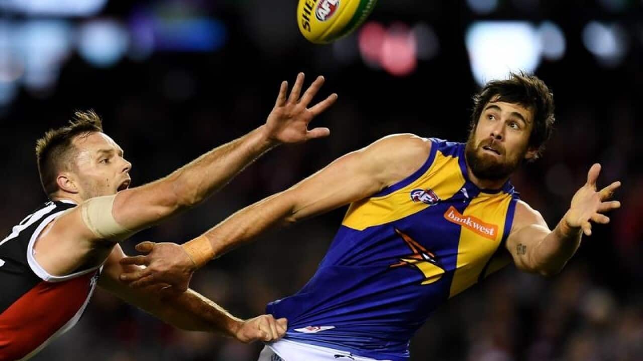 Nathan Brown of the Saints in action against Josh Kennedy in round 20.