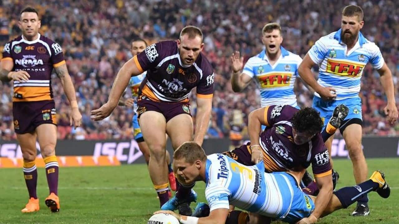 Dale Copley of the Titans scores a try during the Round 4 NRL.