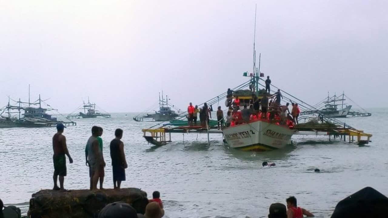 A handout photo made available by the Infanta Local Disaster Risk Reduction Management Office (ILDRRMO)