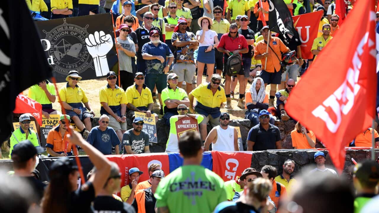 Workers are seen during a protest