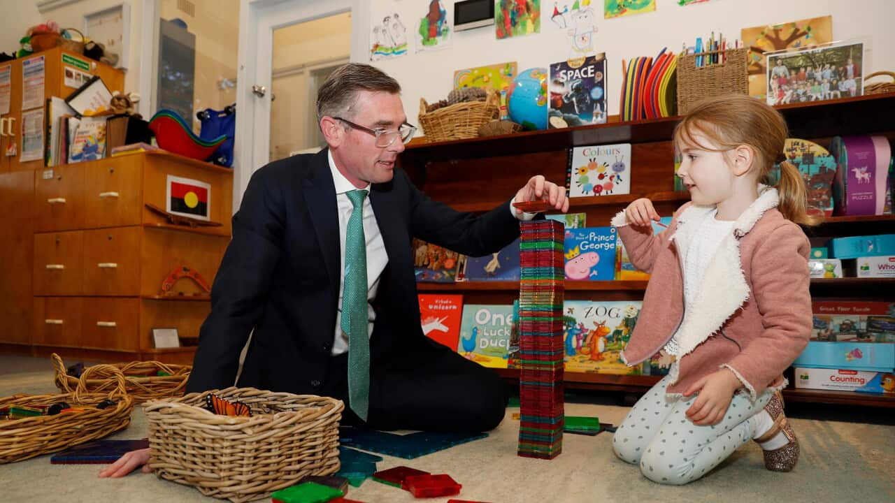 NSW Premier Dominic Perrottet plays with his daughter Harriet at Cheltenham Memorial Preschool in Sydney, Thursday, June 16, 2022. (AAP Image/Pool, Nikki Short) NO ARCHIVING