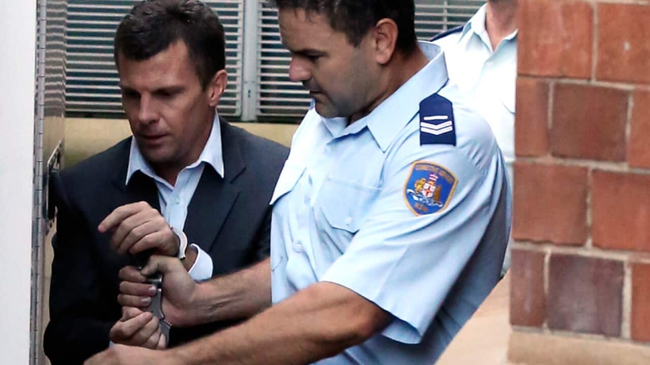 Paul Mulvihill is taken into a prison van outside the Supreme Court