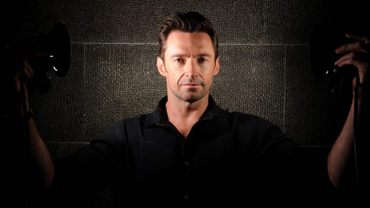 Actor Hugh Jackman poses for photographs in Sydney