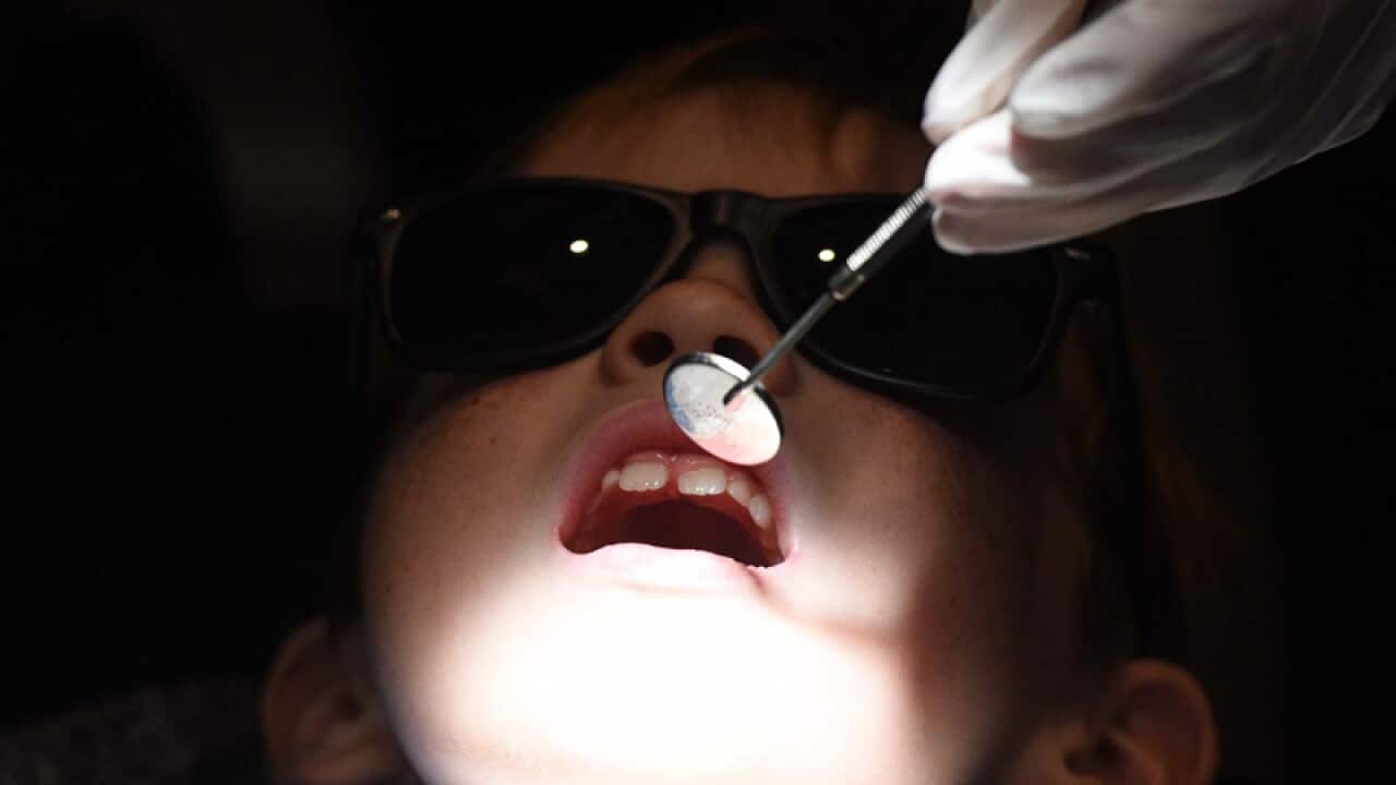 A child during a dental exam