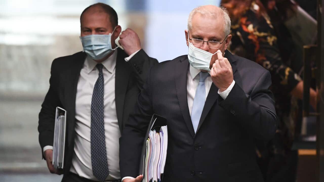 Australian Prime Minister Scott Morrison (right) and Australian Treasurer Josh Frydenberg at Parliament House in Canberra