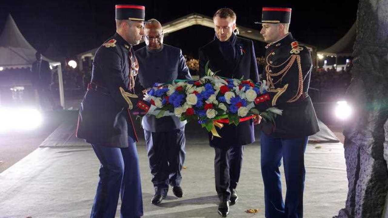 French President Emmanuel Macron lays a wreath at the parc de Champagne in Reims. Mr Macron has urged the formation of a European Army.