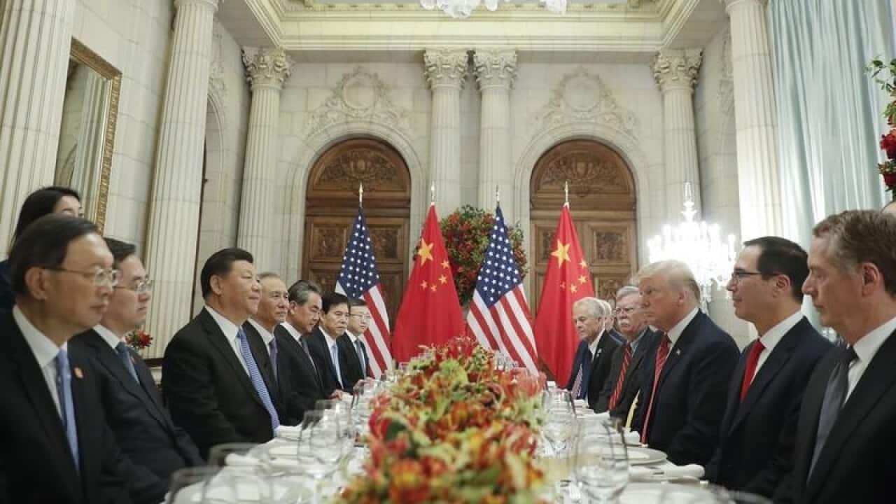 Members of the Chinese and American delegations