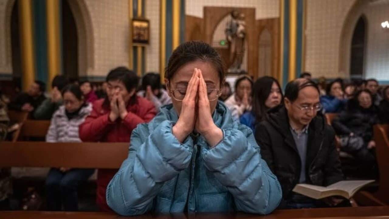Christmas Eve Mass at a church in Beijing. China’s religious believers have jumped into the national battle against the coronavirus.