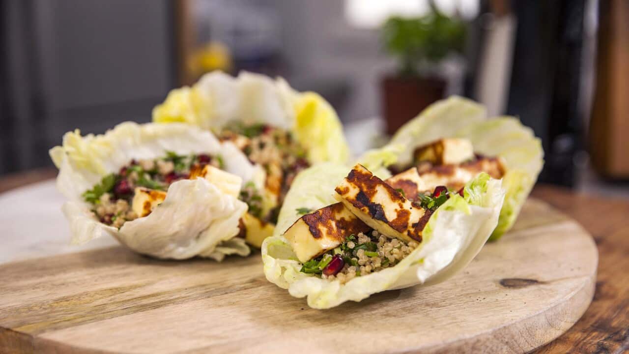 Haloumi salad is served in lettuce leaf cups.